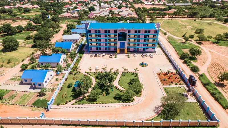 The main building and landscaped grounds seen from above.