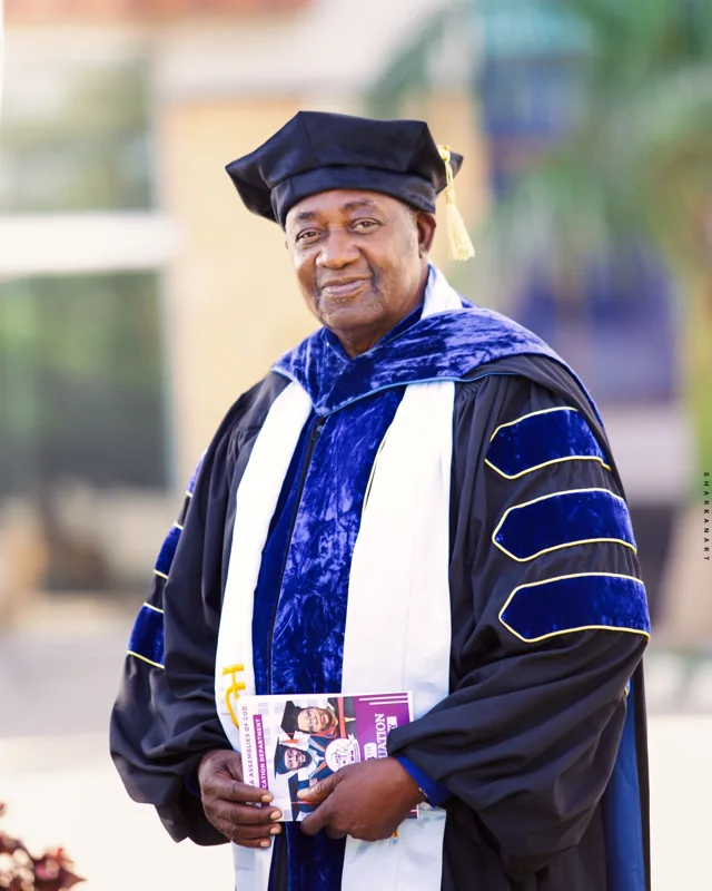 A second portrait of Dr. Jackson Nyanda in academic regalia.